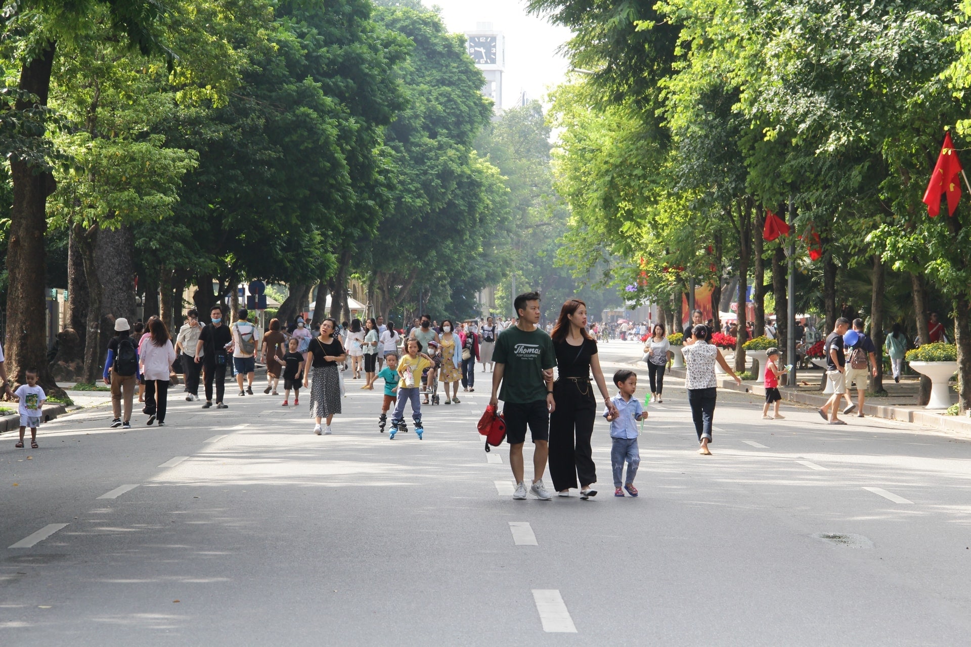 Locals walk along the walking street 